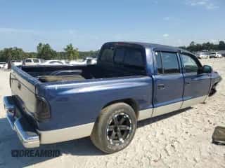 2001 Dodge Dakota Sport z VIN 1B7GL2AN11S171390, wystawiony jako Copart lot #71833495 z przebiegiem 237 486 mil mil oraz Szkoda całkowita • Salvage title. Historia ofert i sprzedaży dostępna na DreamBid. Obrazek 3.