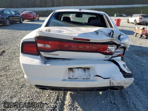2014 Dodge Charger SXT с VIN 2C3CDXHG3EH221675, выставлен на аукционе Copart как лот 82565755 с пробегом 269 748 миль миль и Списание • Salvage title. История ставок и продаж доступна на DreamBid. Изображение 6.