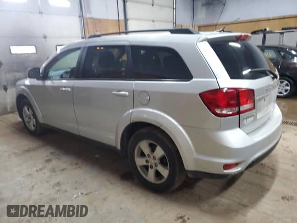 2012 Dodge Journey SXT with VIN 3C4PDCBG6CT214223, listed as a Copart auction lot 71605675 with 262,141 mi miles and Clean title. Bid and sale history available at DreamBid. Image 2.