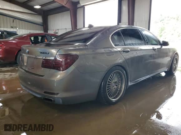 2011 BMW 7 Series 750Li xDrive z VIN WBAKC8C52BC431900, wystawiony jako Copart lot #66447105 z przebiegiem 136 000 mil mil oraz Szkoda całkowita • Salvage title. Historia ofert i sprzedaży dostępna na DreamBid. Obrazek 3.