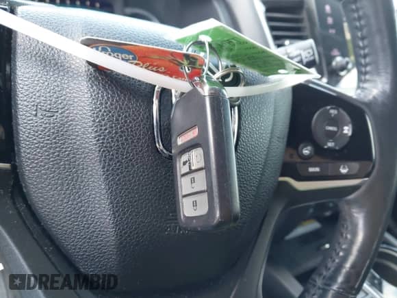 2020 Honda Pilot Elite with VIN 5FNYF6H0XLB032663, listed as a IAAI auction lot 42336547 with 102,386 mi miles and . Bid and sale history available at DreamBid. Image 11.