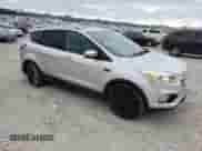 2017 Ford Escape Titanium с VIN 1FMCU0JD9HUD04723, выставлен на аукционе Copart как лот 87801365 с пробегом 126 452 миль миль и Списание • Salvage title. История ставок и продаж доступна на DreamBid. Изображение 4.