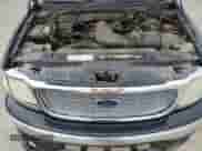 2000 Ford F-150 XL z VIN 2FTRX07L1YCB10191, wystawiony jako Copart lot #86184045 z przebiegiem Nie podano mil oraz Szkoda całkowita • Salvage title. Historia ofert i sprzedaży dostępna na DreamBid. Obrazek 11.