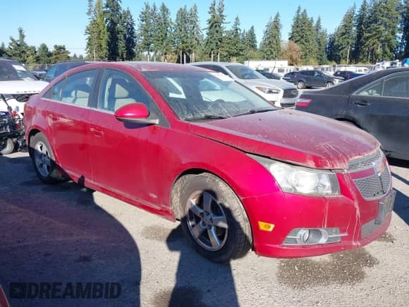 2011 Chevrolet Cruze 2LT z VIN 1G1PG5S96B7271439, wystawiony jako IAAI lot #43455446 z przebiegiem 160 257 mil mil oraz . Historia ofert i sprzedaży dostępna na DreamBid. Obrazek 1.