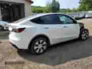 2023 Tesla Model Y Long Range with VIN 7SAYGDEE1PF764576, listed as a Copart auction lot 67882145 with 40,313 mi miles and Salvage title. Bid and sale history available at DreamBid. Image 3.