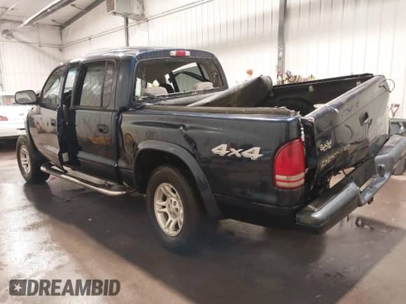 2004 Dodge Dakota Sport with VIN 1D7HG38N44S615599, listed as a IAAI auction lot 41821822 with Not provided miles and . Bid and sale history available at DreamBid. Image 3.