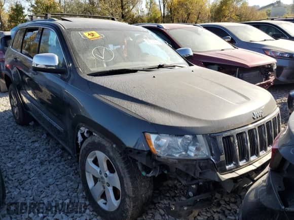 2011 Jeep Grand Cherokee 70th Anniversary z VIN 1J4RR4GT0BC632321, wystawiony jako Copart lot #66772334 z przebiegiem 203 708 mil mil oraz Szkoda całkowita • Salvage title. Historia ofert i sprzedaży dostępna na DreamBid. Obrazek 4.