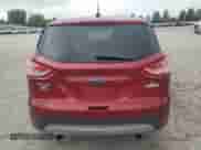 2014 Ford Escape SE with VIN 1FMCU0GX2EUD93239, listed as a Copart auction lot 83942805 with 124,871 mi miles and Salvage title. Bid and sale history available at DreamBid. Image 6.
