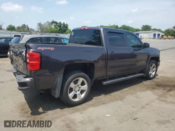 2015 Chevrolet Silverado 1500 LT with VIN 3GCUKREH4FG379779, listed as a Copart auction lot 61352135 with 165,378 mi miles and Salvage title. Bid and sale history available at DreamBid. Image 3.