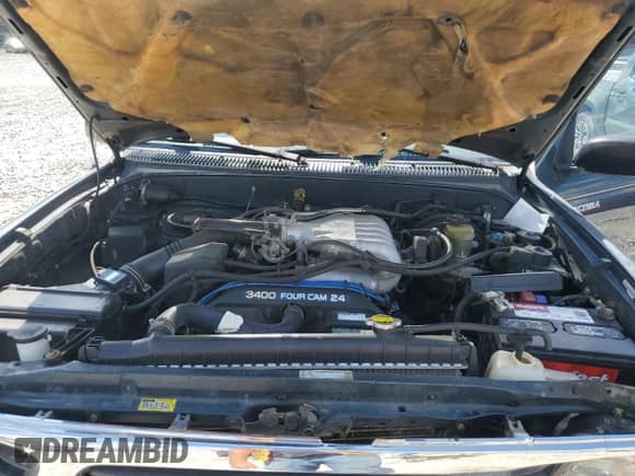 1997 Toyota Tacoma z VIN 4TAWN72N2VZ272710, wystawiony jako Copart lot #66575845 z przebiegiem 276 169 mil mil oraz Czysty tytuł • Clean title. Historia ofert i sprzedaży dostępna na DreamBid. Obrazek 11.