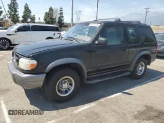 1999 Ford Explorer with VIN 1FMYU22E5XUA41413, listed as a Copart auction lot 52197125 with 202,631 mi miles and Salvage title. Bid and sale history available at DreamBid. Image 1.
