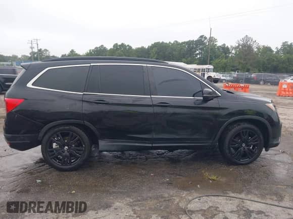 2021 Honda Pilot Special Edition with VIN 5FNYF6H20MB012053, listed as a IAAI auction lot 43003524 with 73,961 mi miles and . Bid and sale history available at DreamBid. Image 13.