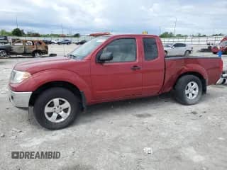 2010 Nissan Frontier SE with VIN 1N6AD0CW2AC432515, listed as a Copart auction lot 57451095 with 138,446 mi miles and Salvage title. Bid and sale history available at DreamBid. Image 1.