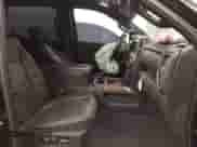 2022 Chevrolet Silverado 1500 High Country with VIN 3GCUYHEL8NG199801, listed as a IAAI auction lot 41256206 with 26,093 mi miles and . Bid and sale history available at DreamBid. Image 5.