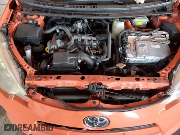 2012 Toyota Prius One z VIN JTDKDTB3XC1008921, wystawiony jako Copart lot #82726485 z przebiegiem Nie podano mil oraz Szkoda całkowita • Salvage title. Historia ofert i sprzedaży dostępna na DreamBid. Obrazek 11.