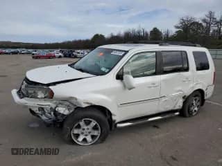 2011 Honda Pilot Touring with VIN 5FNYF4H9XBB106021, listed as a Copart auction lot 86587025 with 131,073 mi miles and Salvage title. Bid and sale history available at DreamBid. Image 1.