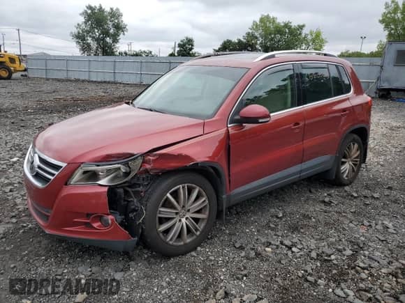 2010 Volkswagen Tiguan SE с VIN WVGBV7AX2AW000641, выставлен на аукционе Copart как лот 65805665 с пробегом 134 584 миль миль и Списание • Salvage title. История ставок и продаж доступна на DreamBid. Изображение 1.