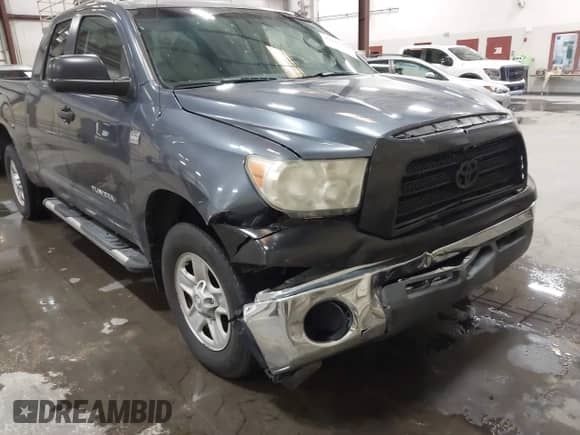 2008 Toyota Tundra z VIN 5TFRT54198X023567, wystawiony jako IAAI lot #43289726 z przebiegiem 185 308 mil mil oraz . Historia ofert i sprzedaży dostępna na DreamBid. Obrazek 17.