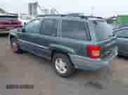 2003 Jeep Grand Cherokee Laredo with VIN 1J4GW48S23C610697, listed as a IAAI auction lot 43178617 with 227,331 mi miles and . Bid and sale history available at DreamBid. Image 3.