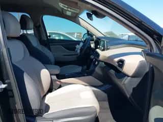 2019 Hyundai Santa Fe SE z VIN 5NMS23AD9KH136183, wystawiony jako IAAI lot #43399476 z przebiegiem 128 859 mil mil oraz . Historia ofert i sprzedaży dostępna na DreamBid. Obrazek 5.