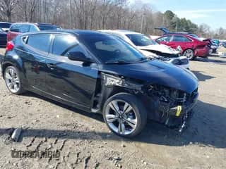 2017 Hyundai Veloster with VIN KMHTC6AD1HU321280, listed as a IAAI auction lot 41294268 with 59,139 mi miles and . Bid and sale history available at DreamBid. Image 1.