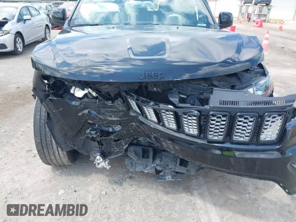 2021 Jeep Grand Cherokee Laredo E z VIN 1C4RJFAG0MC561001, wystawiony jako IAAI lot #42811025 z przebiegiem 48 959 mil mil oraz . Historia ofert i sprzedaży dostępna na DreamBid. Obrazek 6.