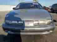 1997 Saturn SW with VIN 1G8ZK8279VZ169005, listed as a Copart auction lot 73049694 with 110,215 mi miles and Salvage title. Bid and sale history available at DreamBid. Image 5.