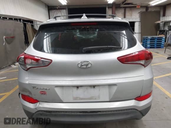 2017 Hyundai Tucson SE with VIN KM8J33A4XHU418628, listed as a IAAI auction lot 42991252 with 96,322 mi miles and . Bid and sale history available at DreamBid. Image 16.