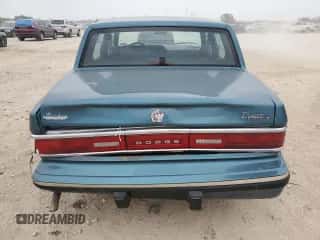 1993 Dodge Dynasty LE с VIN 1B3XC56R3PD124521, выставлен на аукционе Copart как лот 51825725 с пробегом 94 336 миль миль и Списание • Salvage title. История ставок и продаж доступна на DreamBid. Изображение 6.