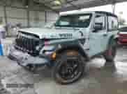 2023 Jeep Wrangler Sport with VIN 1C4HJXAG3PW633586, listed as a Copart auction lot 58744785 with 32,212 mi miles and Salvage title. Bid and sale history available at DreamBid. Image 1.