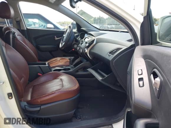 2012 Hyundai Tucson GLS with VIN KM8JU3AC1CU518372, listed as a IAAI auction lot 43323058 with 130,824 mi miles and . Bid and sale history available at DreamBid. Image 5.