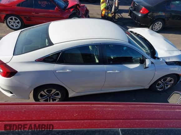 2016 Honda Civic LX z VIN 19XFC2F59GE242934, wystawiony jako IAAI lot #43139806 z przebiegiem 95 282 mil mil oraz . Historia ofert i sprzedaży dostępna na DreamBid. Obrazek 14.