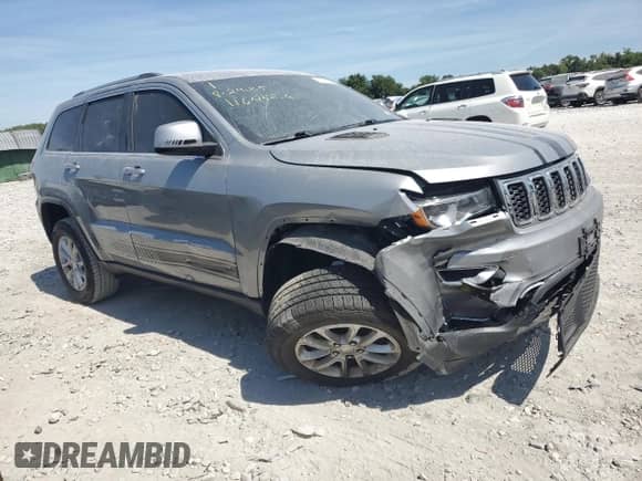 2021 Jeep Grand Cherokee Laredo E with VIN 1C4RJFAGXMC621222, listed as a Copart auction lot 70509785 with 75,482 mi miles and Salvage title. Bid and sale history available at DreamBid. Image 4.