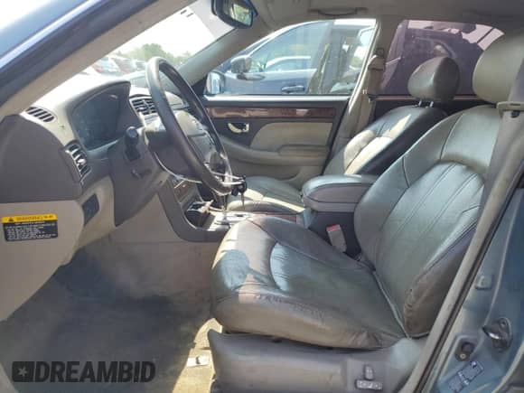 2005 Hyundai XG с VIN KMHFU45E15A382658, выставлен на аукционе Copart как лот 70510875 с пробегом 160 392 миль миль и Списание • Salvage title. История ставок и продаж доступна на DreamBid. Изображение 7.