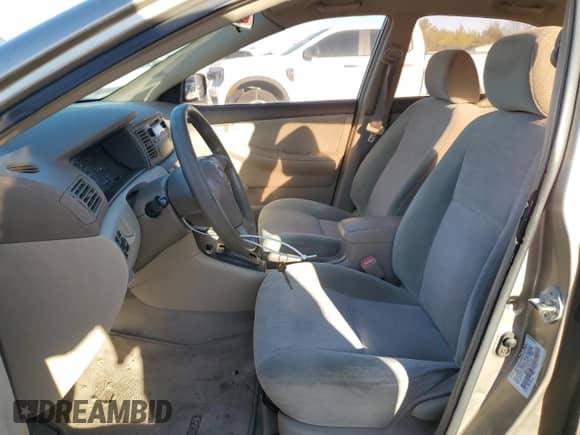 2004 Toyota Corolla CE z VIN 1NXBR32EX4Z211399, wystawiony jako Copart lot #87423445 z przebiegiem 175 091 mil mil oraz Czysty tytuł • Clean title. Historia ofert i sprzedaży dostępna na DreamBid. Obrazek 7.