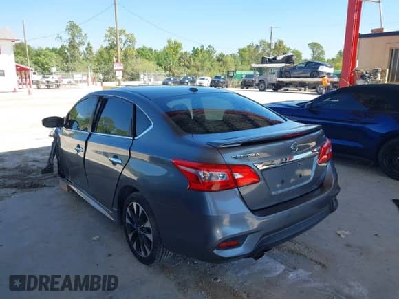 2017 Nissan Sentra SR z VIN 3N1AB7AP4HY212763, wystawiony jako IAAI lot #41674826 z przebiegiem 133 075 mil mil oraz . Historia ofert i sprzedaży dostępna na DreamBid. Obrazek 3.