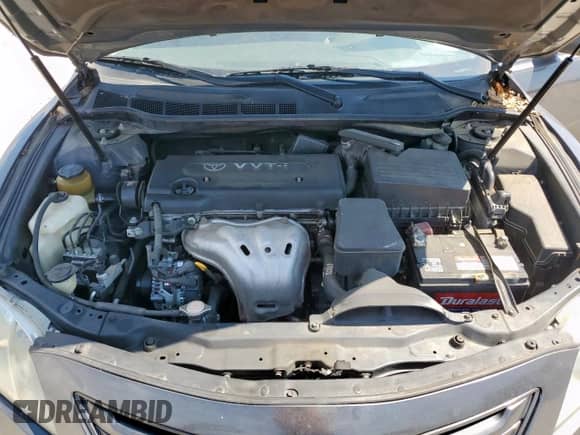 2007 Toyota Camry XLE z VIN 4T1BE46K17U652330, wystawiony jako Copart lot #84743355 z przebiegiem 150 357 mil mil oraz Czysty tytuł • Clean title. Historia ofert i sprzedaży dostępna na DreamBid. Obrazek 11.