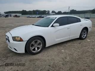 2014 Dodge Charger SXT Plus с VIN 2C3CDXHG9EH306939, выставлен на аукционе Copart как лот 71685595 с пробегом 192 154 миль миль и Чистый • Clean title. История ставок и продаж доступна на DreamBid. Изображение 1.