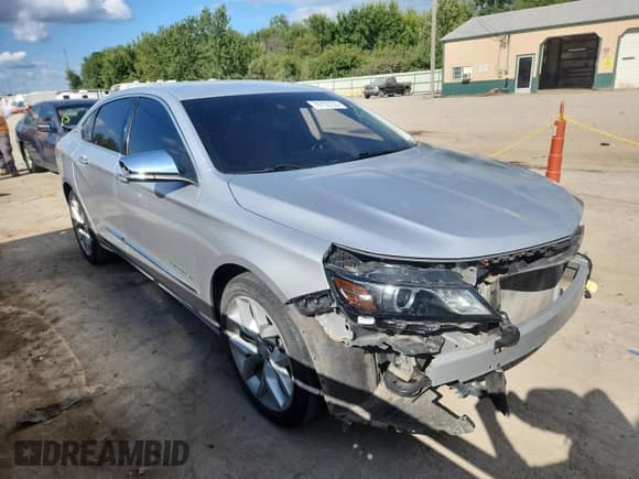 2017 Chevrolet Impala Premier with VIN 1G1145S39HU195218, listed as a Copart auction lot 70153135 with 103,083 mi miles and Salvage title. Bid and sale history available at DreamBid. Image 4.