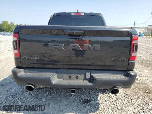 2020 Ram 1500 Rebel z VIN 1C6SRFLT7LN360498, wystawiony jako Copart lot #68648235 z przebiegiem 66 039 mil mil oraz Szkoda całkowita • Salvage title. Historia ofert i sprzedaży dostępna na DreamBid. Obrazek 6.