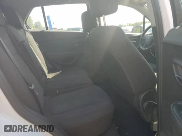 2018 Chevrolet Trax LS z VIN 3GNCJKSB4JL409599, wystawiony jako Copart lot #71651735 z przebiegiem 115 507 mil mil oraz Czysty tytuł • Clean title. Historia ofert i sprzedaży dostępna na DreamBid. Obrazek 11.