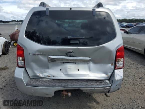 2010 Nissan Pathfinder SE z VIN 5N1AR1NN5AC607690, wystawiony jako Copart lot #85188695 z przebiegiem 184 631 mil mil oraz Szkoda całkowita • Salvage title. Historia ofert i sprzedaży dostępna na DreamBid. Obrazek 6.