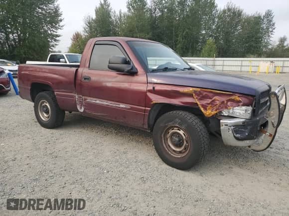 2001 Dodge 1500 Work Special with VIN 1B7HC16X31S724808, listed as a Copart auction lot 71476495 with 147,982 mi miles and Salvage title. Bid and sale history available at DreamBid. Image 4.