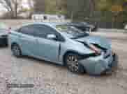 2021 Toyota Prius XLE with VIN JTDL9MFU0M3031094, listed as a Copart auction lot 82648995 with 50,455 mi miles and Salvage title. Bid and sale history available at DreamBid. Image 4.