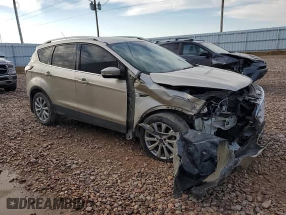 2017 Ford Escape Titanium with VIN 1FMCU9J91HUD60350, listed as a Copart auction lot 67822375 with 149,446 mi miles and Salvage title. Bid and sale history available at DreamBid. Image 4.