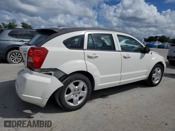 2009 Dodge Caliber SXT с VIN 1B3HB48A89D107788, выставлен на аукционе Copart как лот 72465714 с пробегом 120 549 миль миль и Списание • Salvage title. История ставок и продаж доступна на DreamBid. Изображение 3.