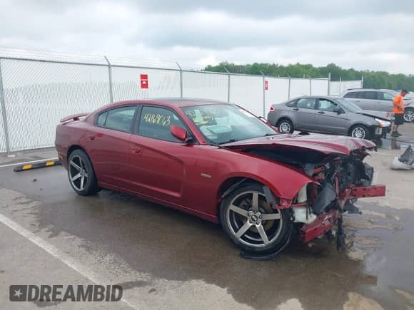 2014 Dodge Charger Road/Track with VIN 2C3CDXCT1EH219590, listed as a IAAI auction lot 42169063 with 145,101 mi miles and . Bid and sale history available at DreamBid. Image 1.