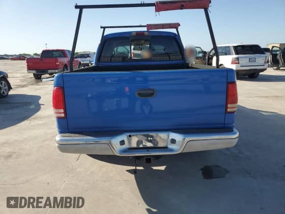 2002 Dodge Dakota SLT with VIN 1B7HL48N32S693817, listed as a Copart auction lot 52126605 with 238,782 mi miles and Salvage title. Bid and sale history available at DreamBid. Image 6.