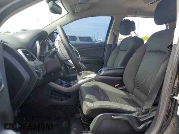 2015 Dodge Journey American Value with VIN 3C4PDCAB2FT644972, listed as a Copart auction lot 64377425 with 131,776 mi miles and Salvage title. Bid and sale history available at DreamBid. Image 7.