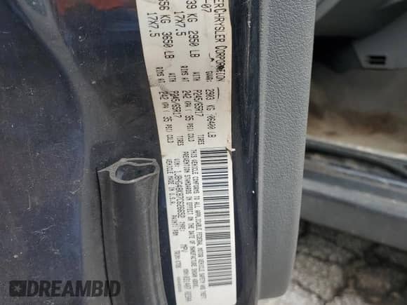 2007 Jeep Commander Sport z VIN 1J8HG48K87C626652, wystawiony jako Copart lot #67465245 z przebiegiem 285 567 mil mil oraz Szkoda całkowita • Salvage title. Historia ofert i sprzedaży dostępna na DreamBid. Obrazek 13.